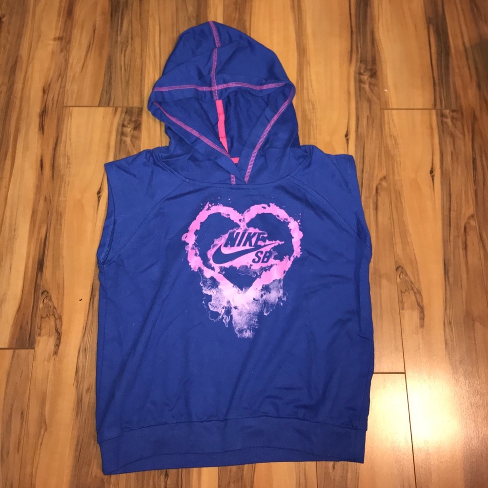 Sleeveless top with hood