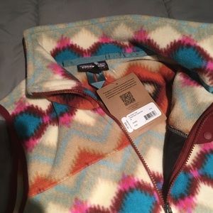 Patagonia fleece vest.  Multi colored.