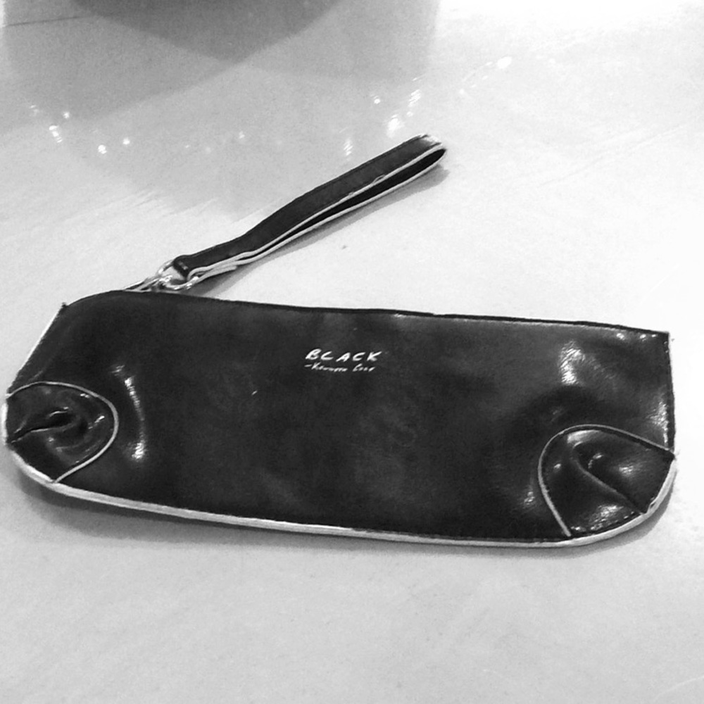 A Black Kenneth Cole Wristlet