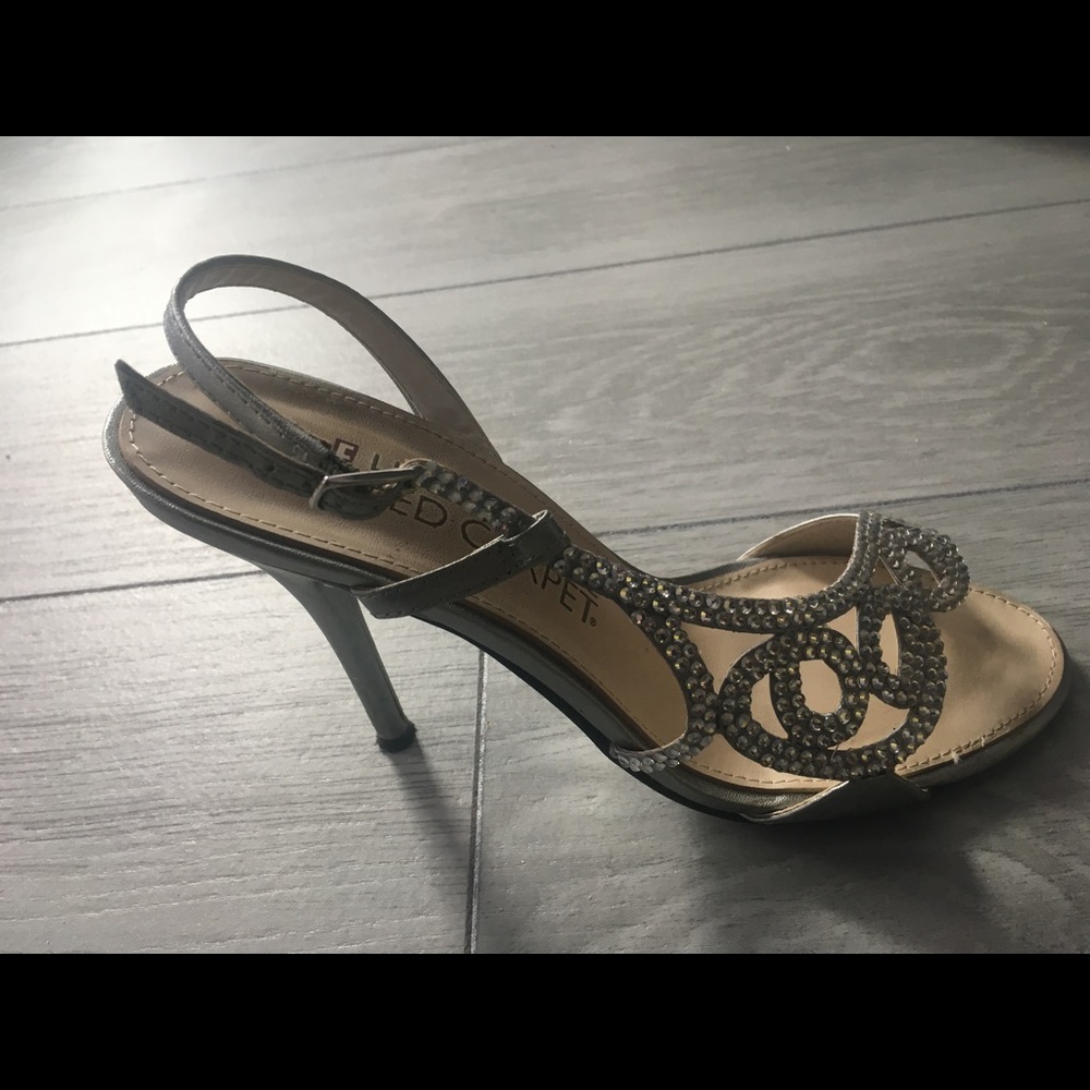 Silver high heel  with silver stone size 7