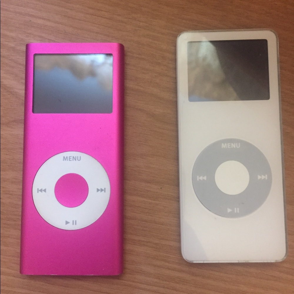one white and one pink Ipod nano