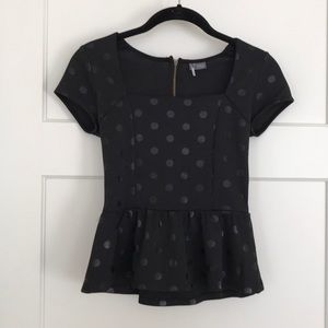 Black polka dot peplum shirt