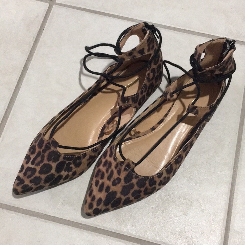 Express cheetah lace up flats