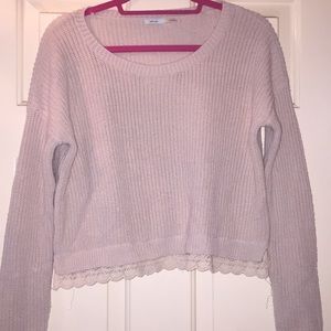 Tan knit sweater with lace at the bottom