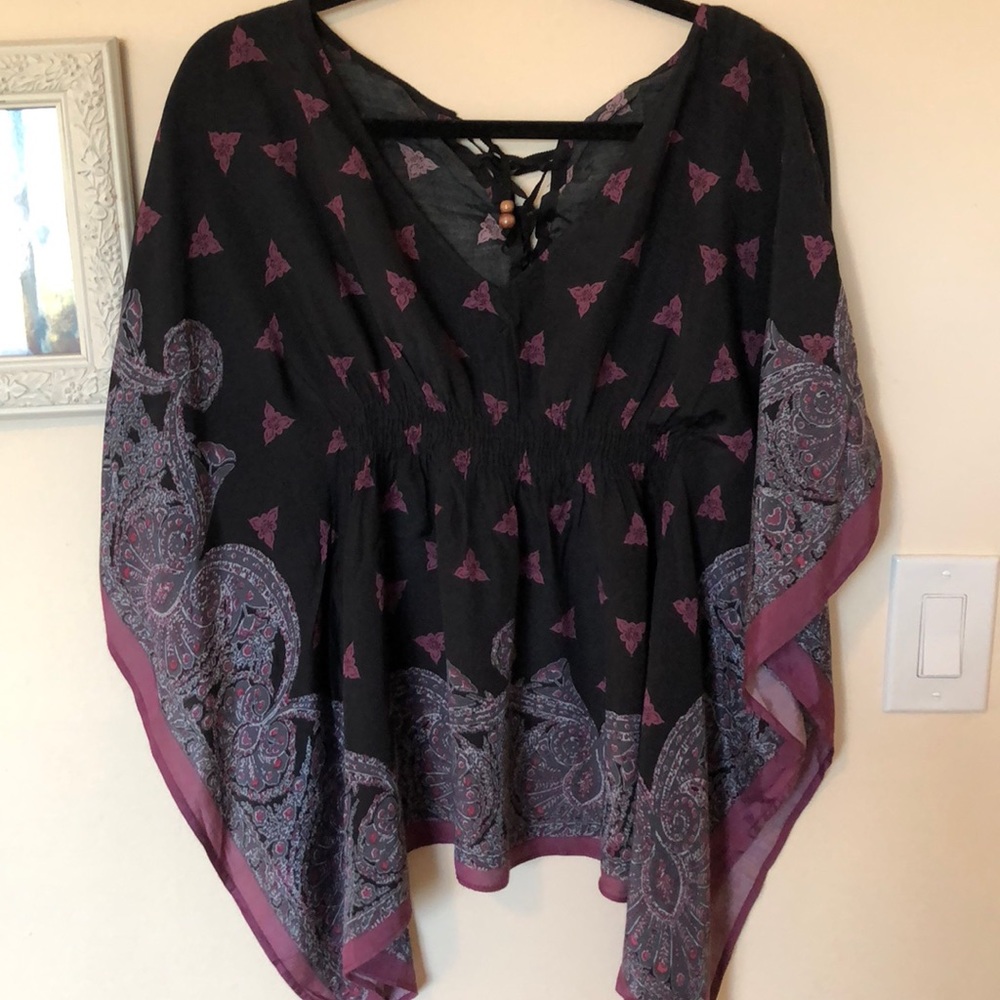 Free people flowy blouse, with back detail