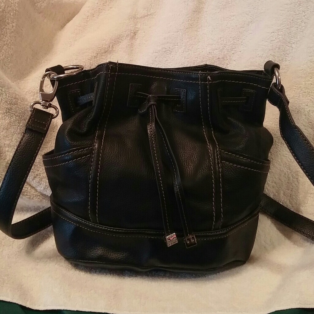 Tignanello like new used only once for a day.Firm