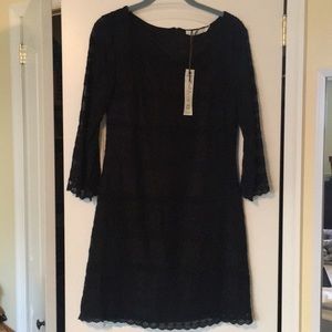 Flattering black lace overlay dress