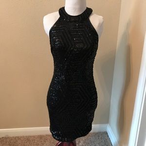 Black sequin open back dress