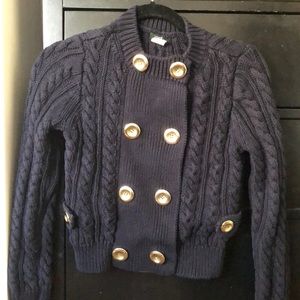 Sweater with gold buttons
