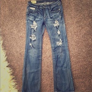 Machine distressed jeans
