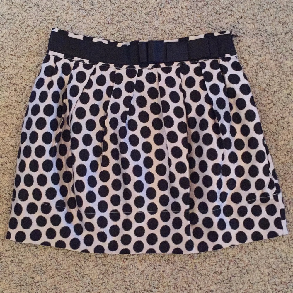 White skirt with black polka dots