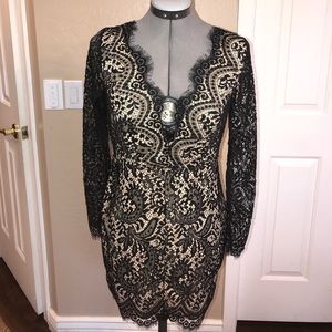 Lace low cut dress with open back