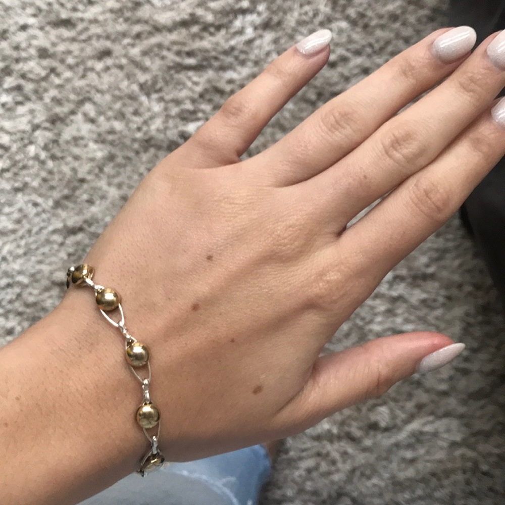 ✨Silver and gold-tone bracelet