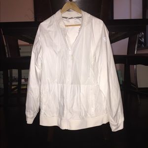 TWO NEW NIKE JACKETS AND MATCHING SHORTS