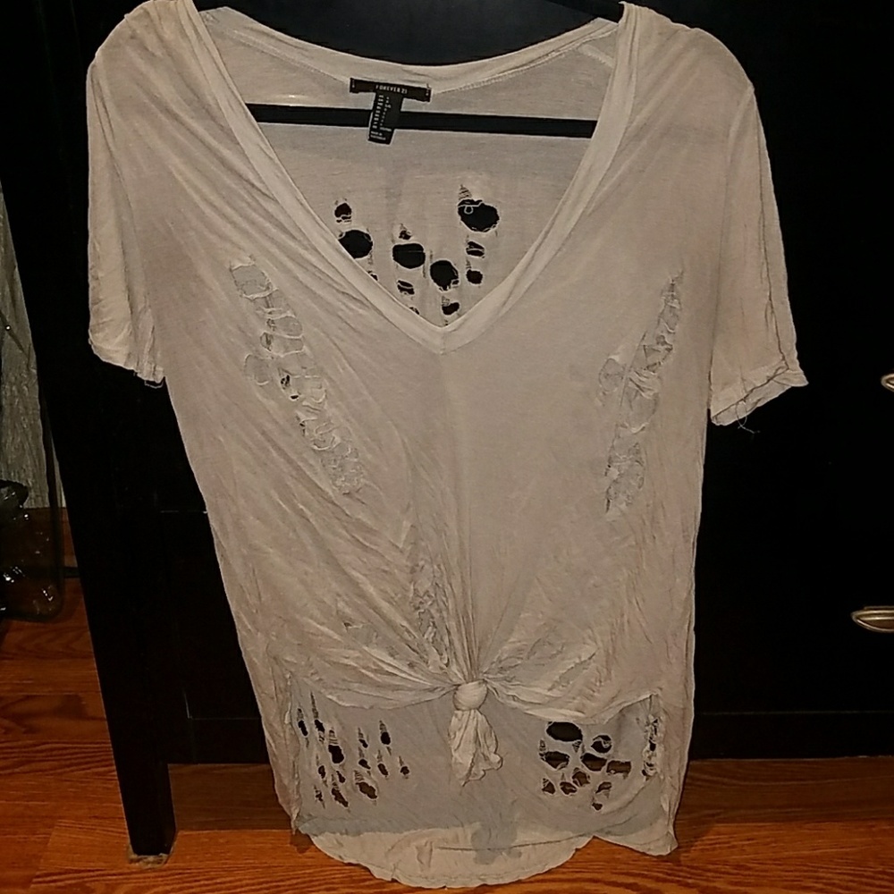 A cream colored shirt