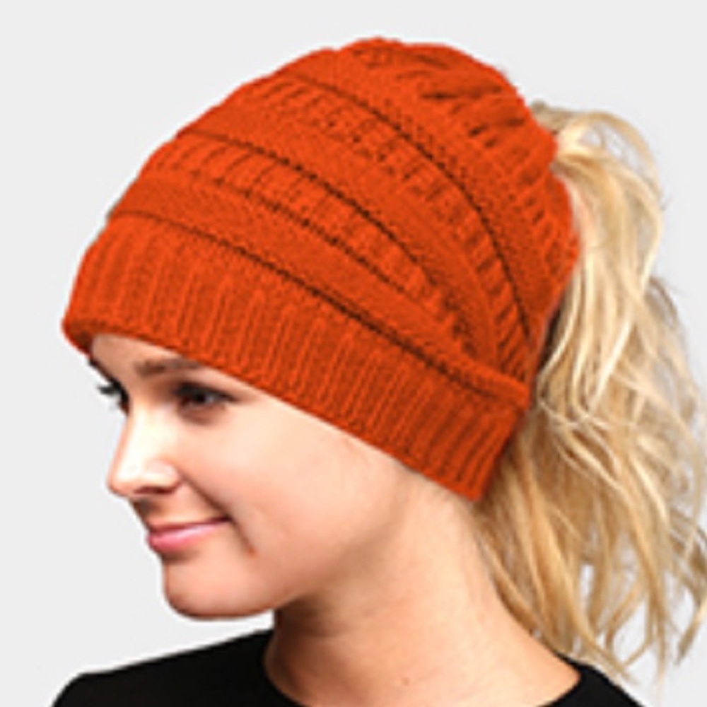 Ponytail knit stocking cap.