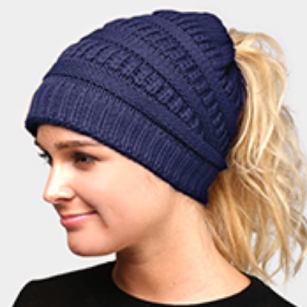 Stretchy ponytail stocking cap.