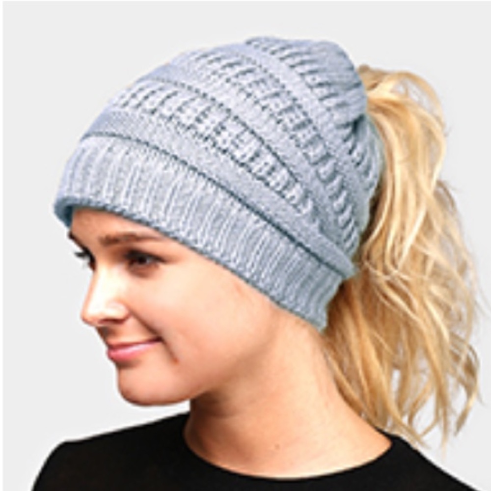 Slate blue knit hat with ponytail opening