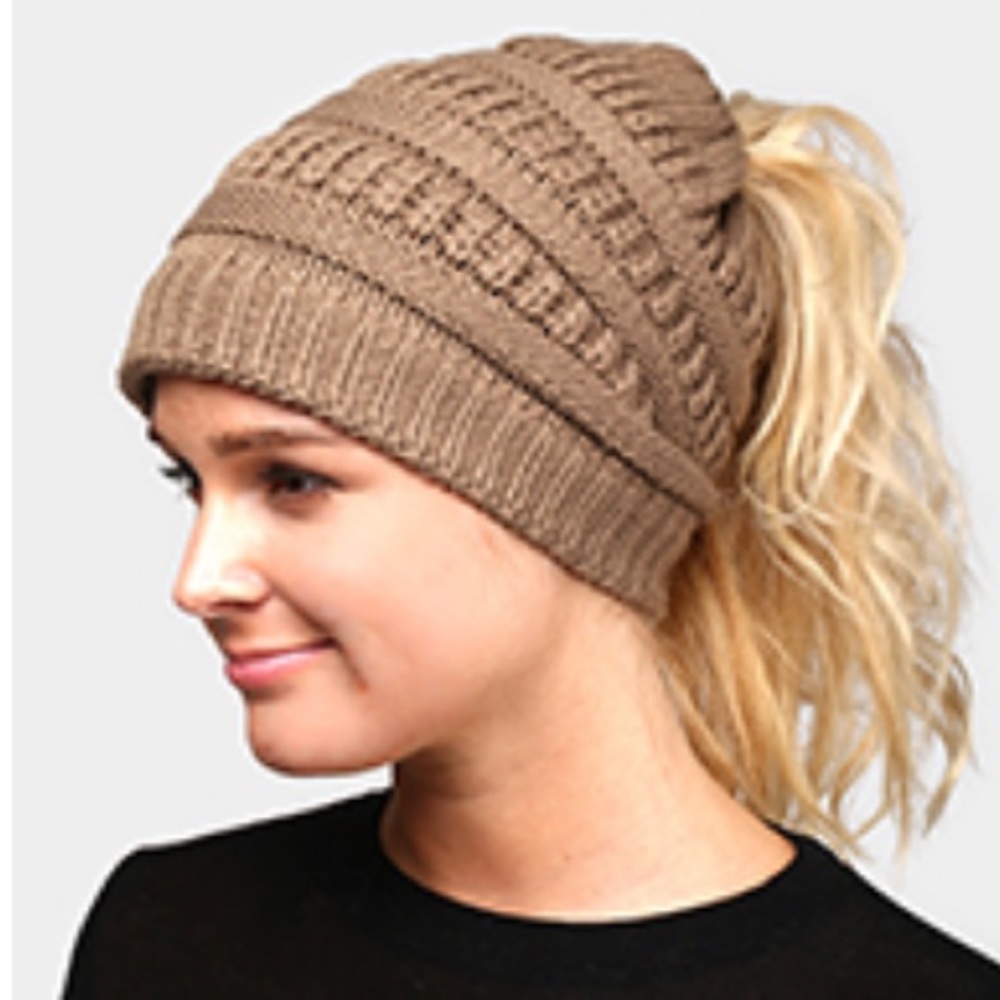 Tan knit stocking cap with ponytail opening