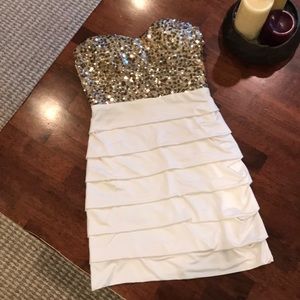 Gold and white short dress.