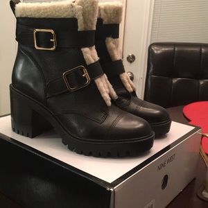 Black Nine West booties with shearling trim