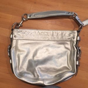 Silver coach purse