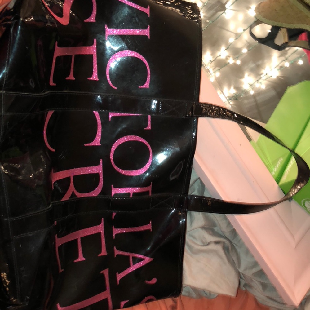 a black Victoria secret bag