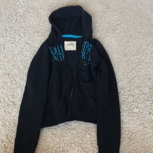 Hollister black jacket with blue lettering