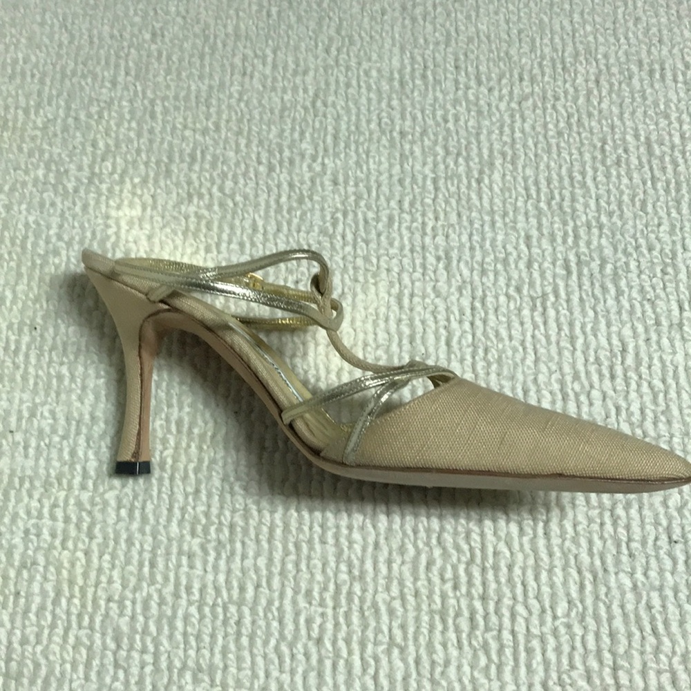 Manolo Blahnik Strappy closed toe shoes.