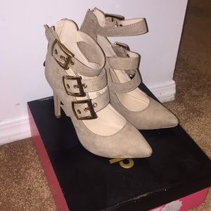 Nude buckle pumps
