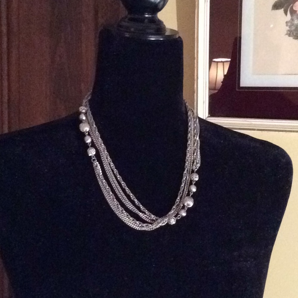 Pretty silver tone long neck chain