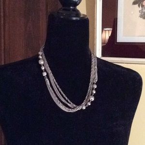 Pretty silver tone long neck chain