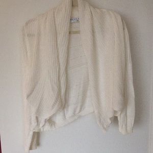 White shrug sweater