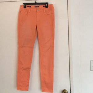 Orange stretchy jeans