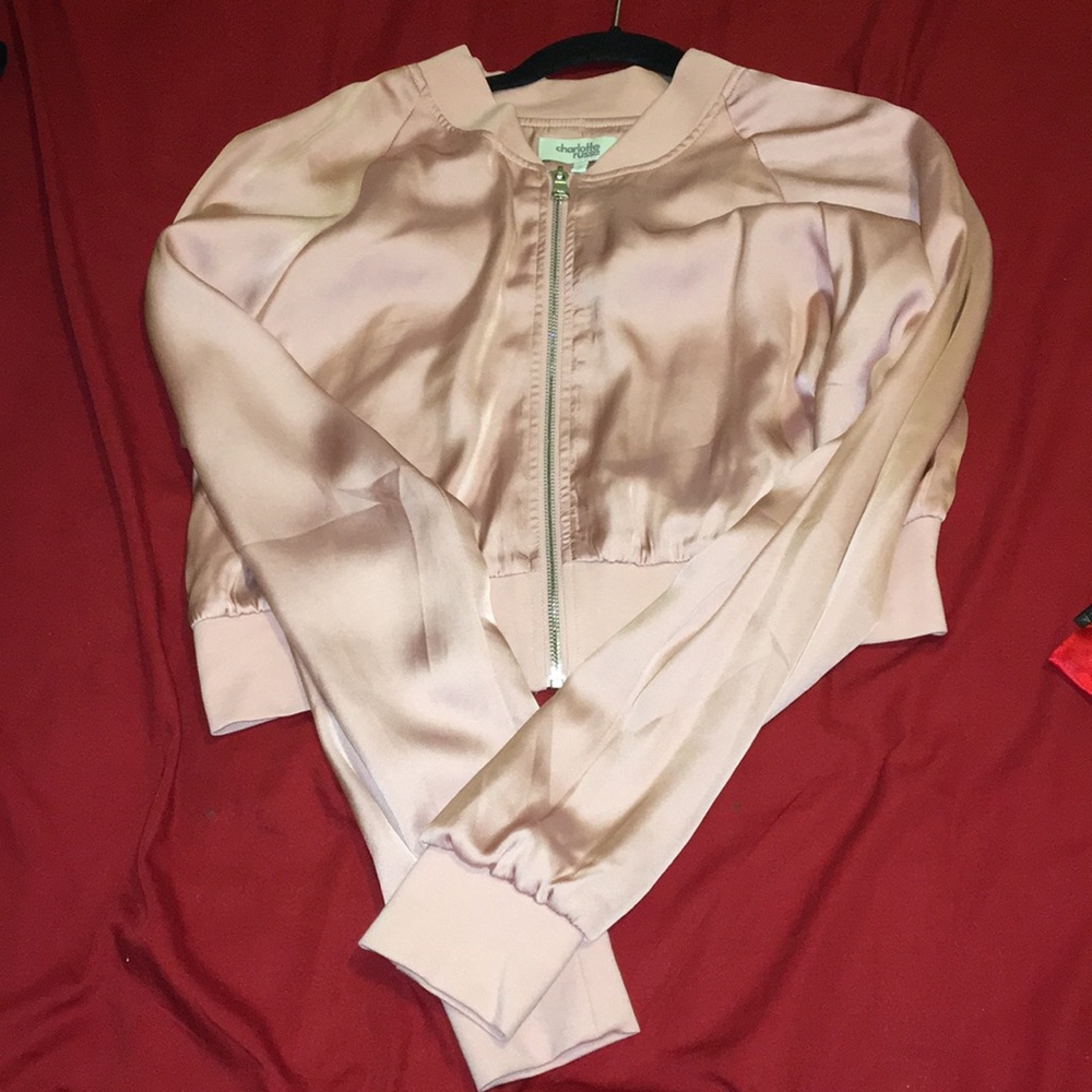 Pink cropped jacket.