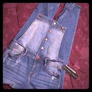 Blue denim overalls