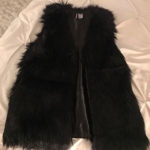 Black fake fur vest