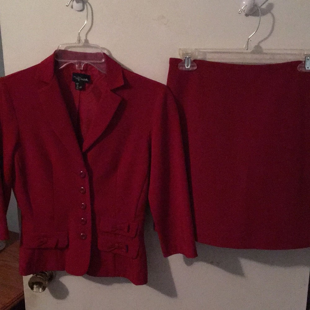 Red blazer and skirt business suit