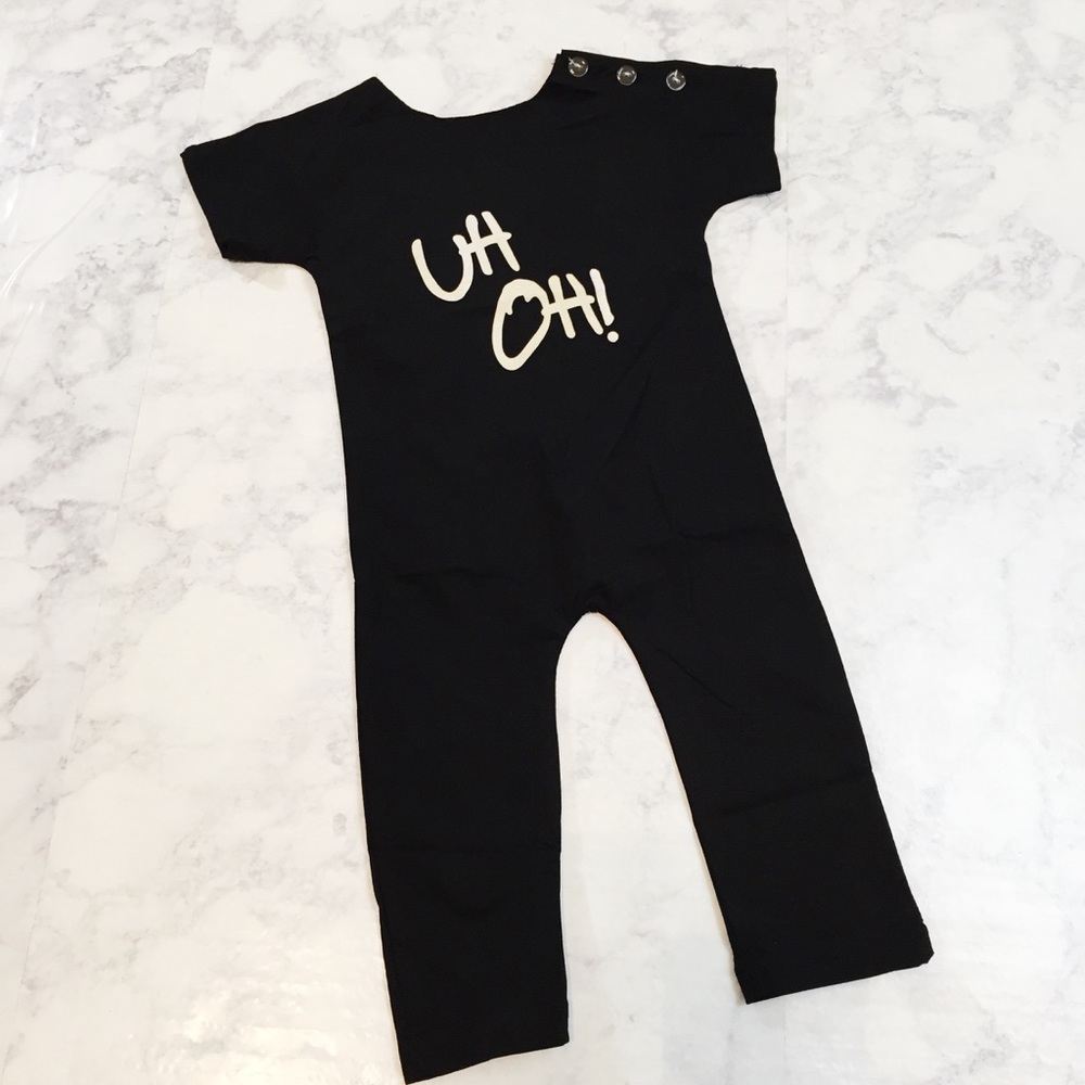 NWT Jump Around Co. Black "Uh Oh" Printed Romper