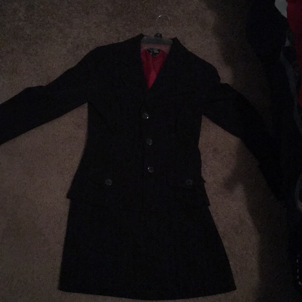 Pinstriped black business skirt suit