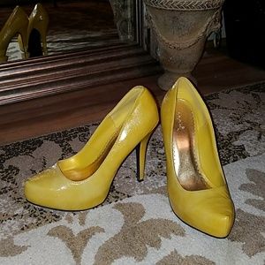 Yellow Patent Pumps