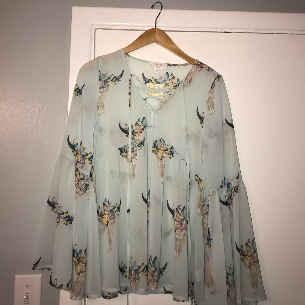 Bell sleeved lace up boutique blouse