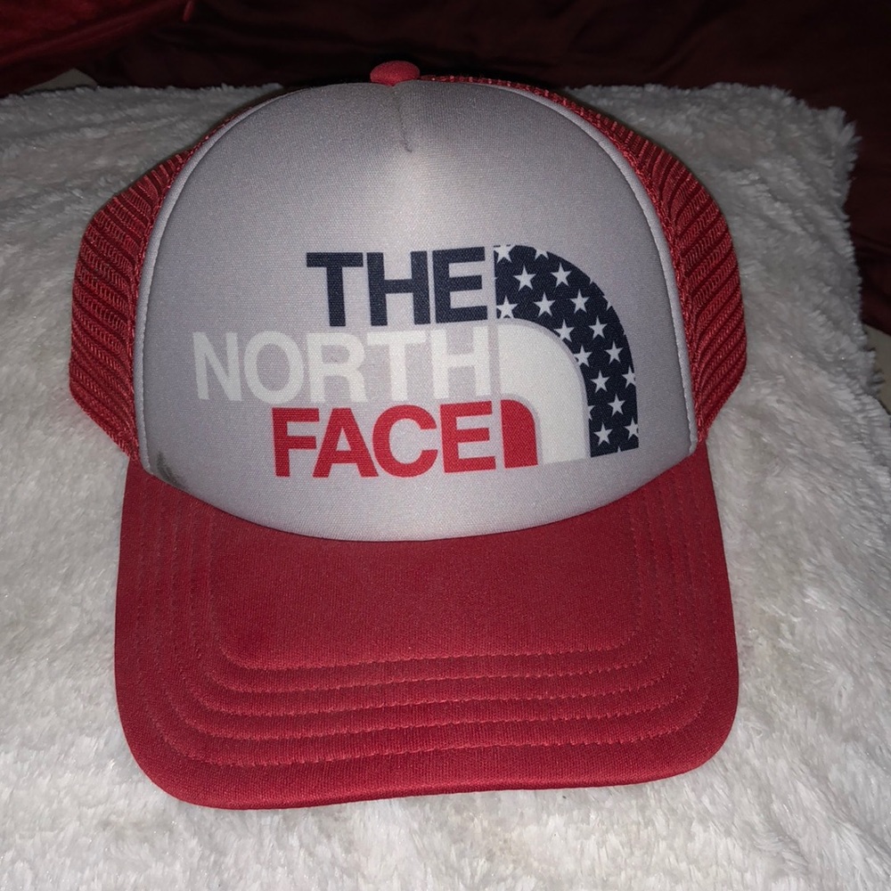 Red North Face Trucker Hat.