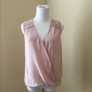 Pink surplice top with lace detail