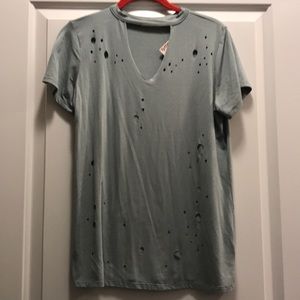 Grey shirt with holes