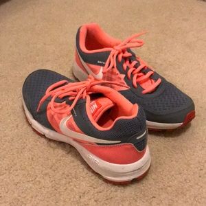 Peachy pink and grey Nike’s. Size 8.