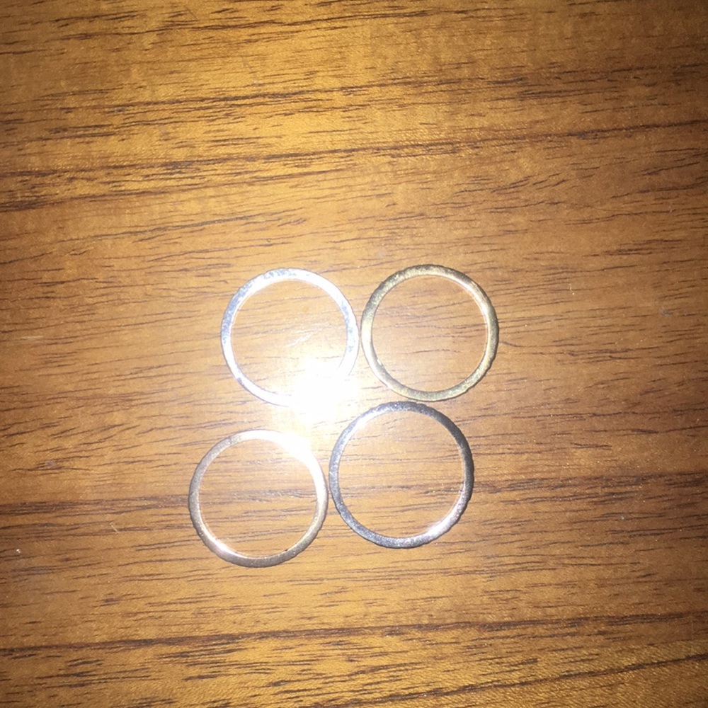 Silver, rose gold, and gray ring set