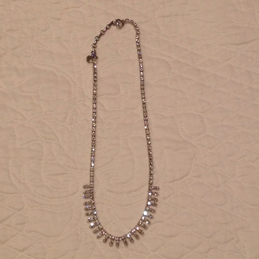 Women's rhinestone necklace. Measures 20" long.