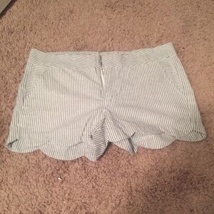 Striped shirts with scalloped hem