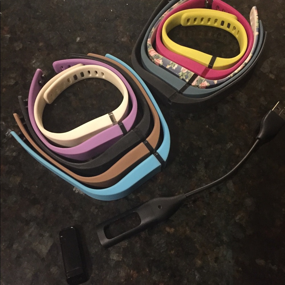 Fitbit flex with charger and 10 large bands
